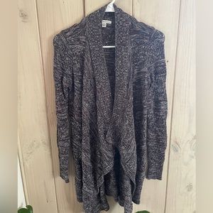 Red white and blue knitted cardigan.